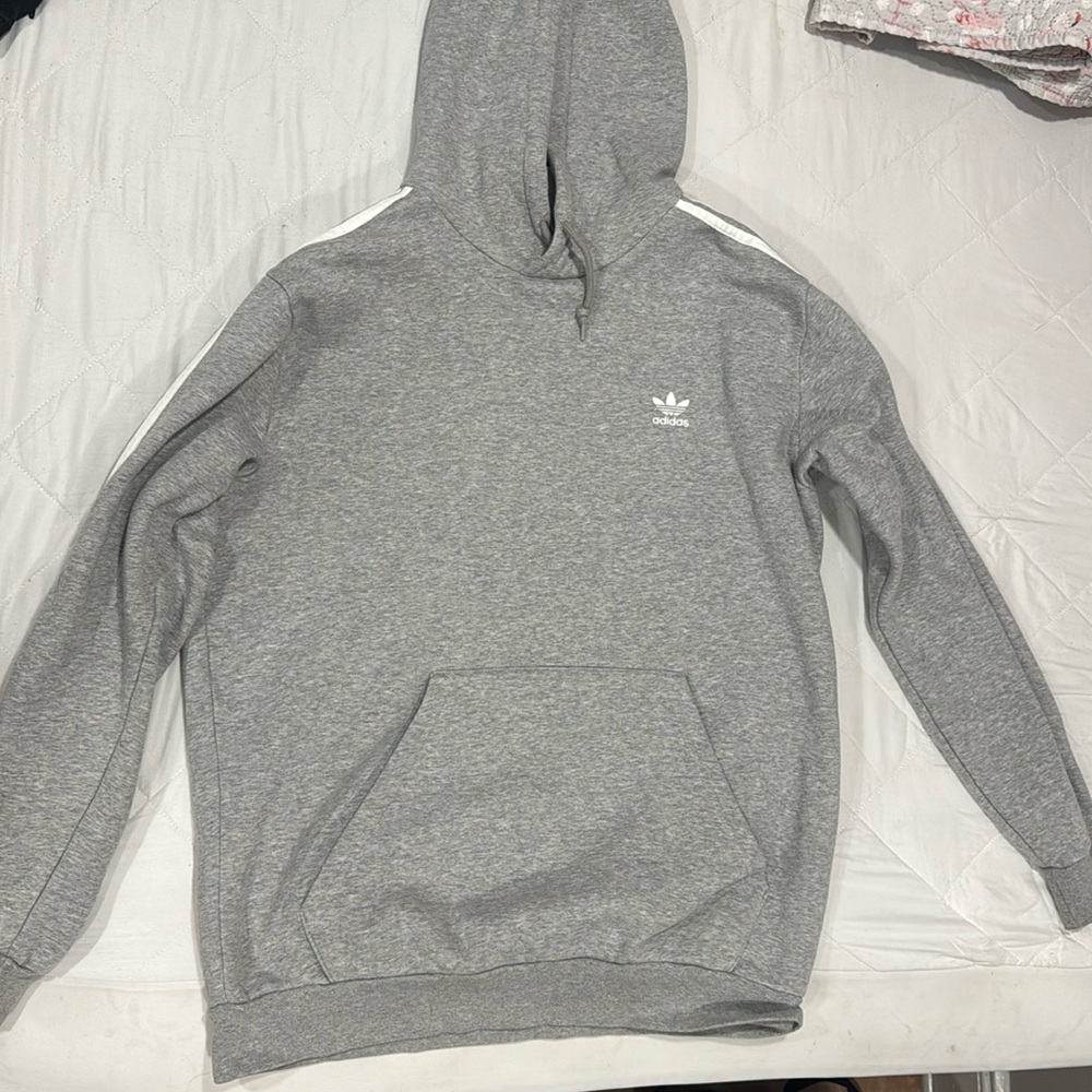 Adidas 
Grey hoodie, 3-Stripes detailing at sleeves, 
Kangaroo pocket at front